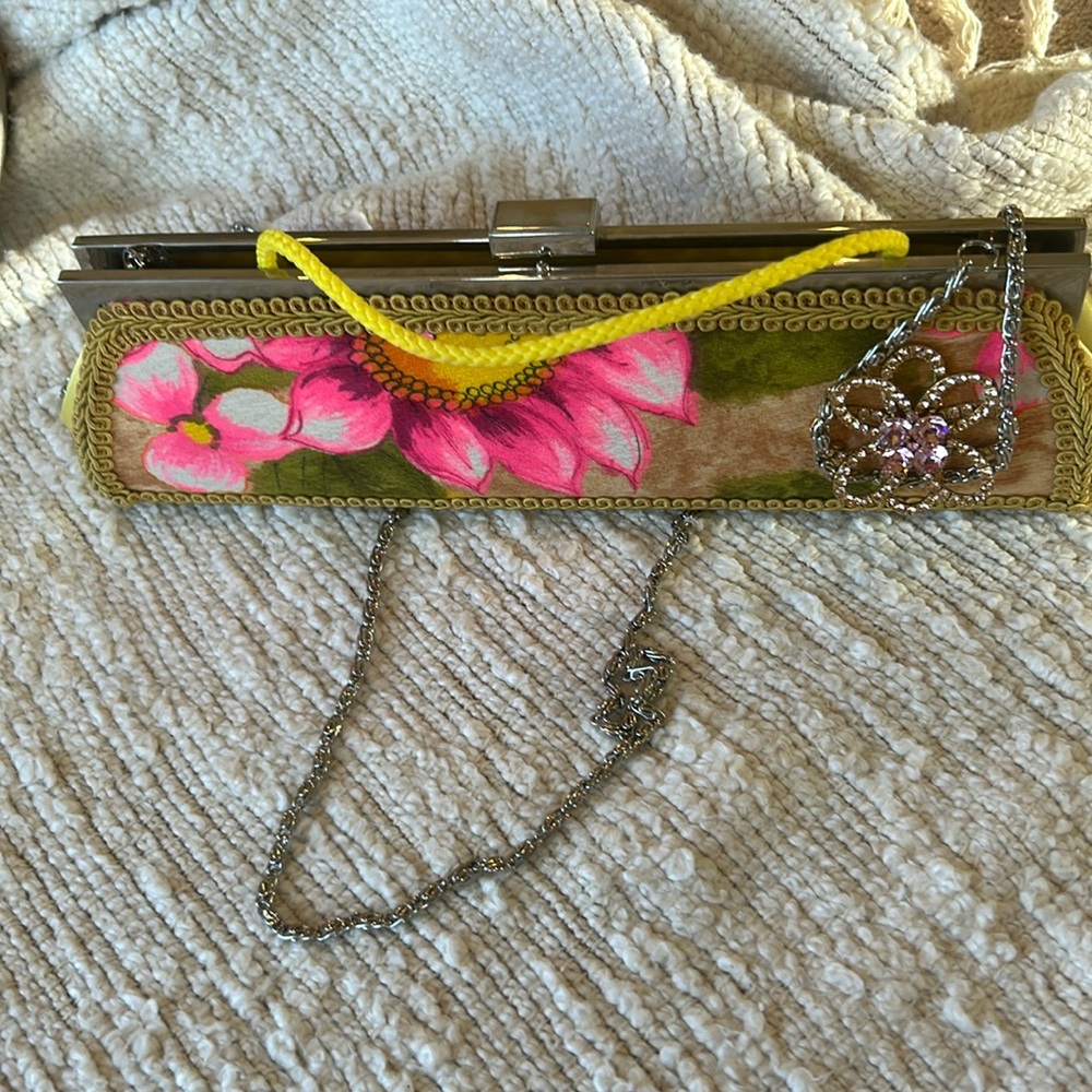 Lauren Scherr designer purse with beautiful pin. Bright colors pink/ yellow.